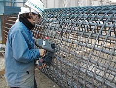 Construction site where reinforced steel is fixed with an automatic rebar tier
